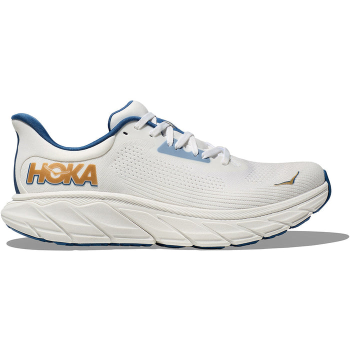 Quarter turn view Men's Hoka Footwear style name Arahi 7 in color Frost/ Gold. Sku: 1147850-FTG