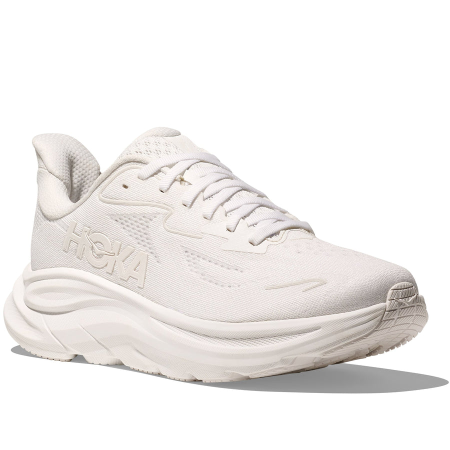 Quarter turn view Men's Hoka Footwear style name Clifton 10 in color White/ White. Sku: 1162030-WWH