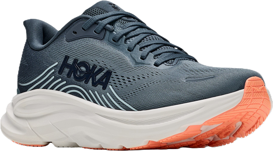 A HOKA running shoe in slate blue-gray with a thick white midsole and a bright orange outsole, shown from a three-quarters angle on a white background.