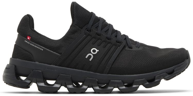 Black athletic shoe with brand logo on a white background