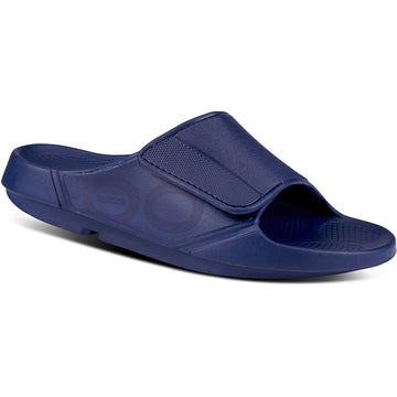 Quarter turn view Unisex Oofos Footwear style name Ooahh Sport Flex Slide in color Navy. Sku: 1550NAVY