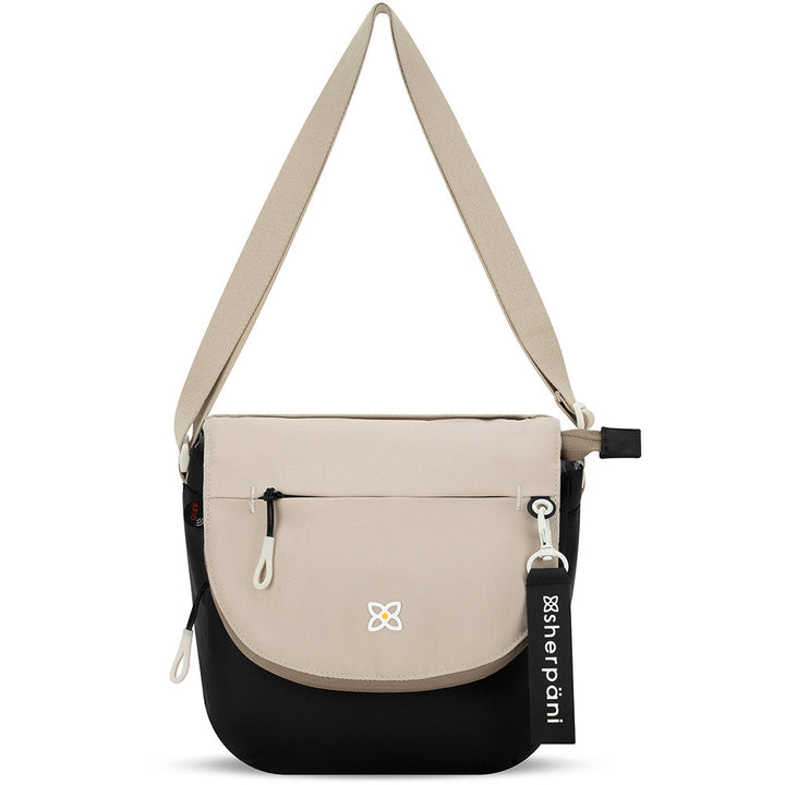 Quarter turn view Women's Sherpani Hand Bag style name Milli in color Con Leche. Sku: 24-MILLI08110