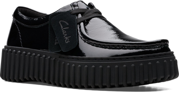 Quarter turn view Women's Clarks Footwear style name Torhill Bee in color BLACK PAT. Sku: 26179111