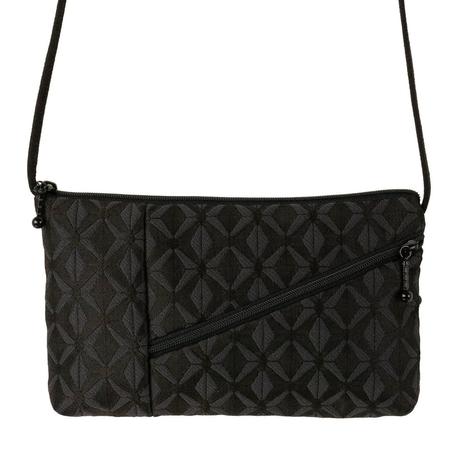 Quarter turn view Unisex Maruca Hand Bag style name Tomboy in color Diamond Black. Sku: 302-809