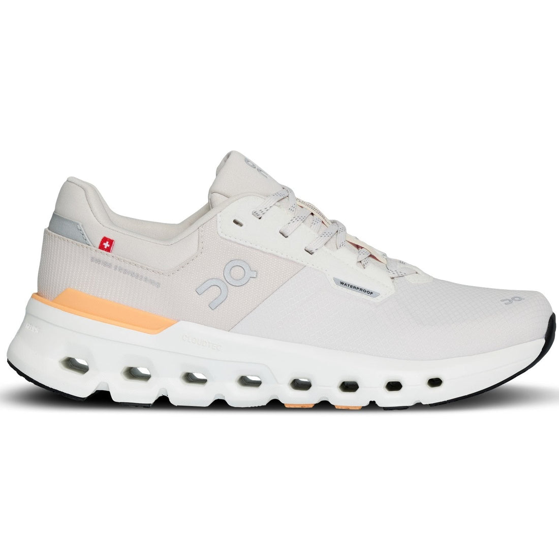 White running shoe with orange accents on a white background