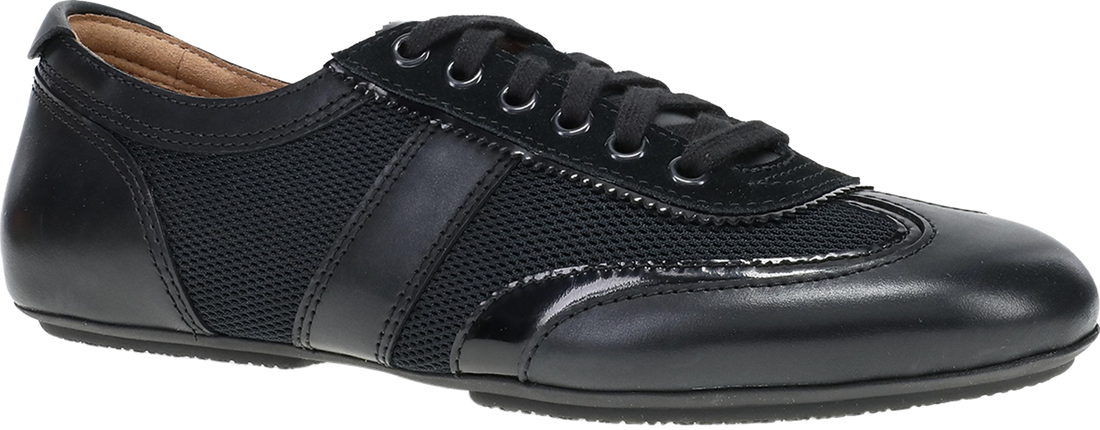 A black low-top lace-up shoe with a mix of smooth leather and mesh textures, shown from a side profile on a white background.