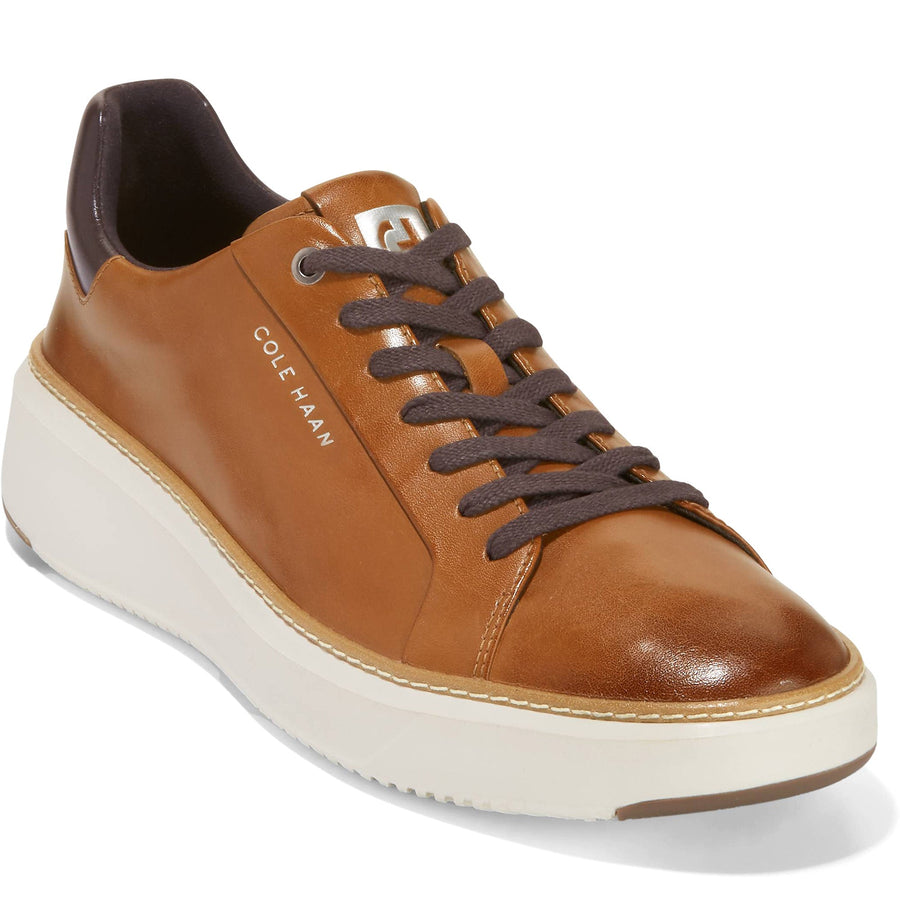 Quarter turn Men's Cole Haan Footwear style name Grandpro Topspin Wide in color Brit Tan. Sku: C34229W