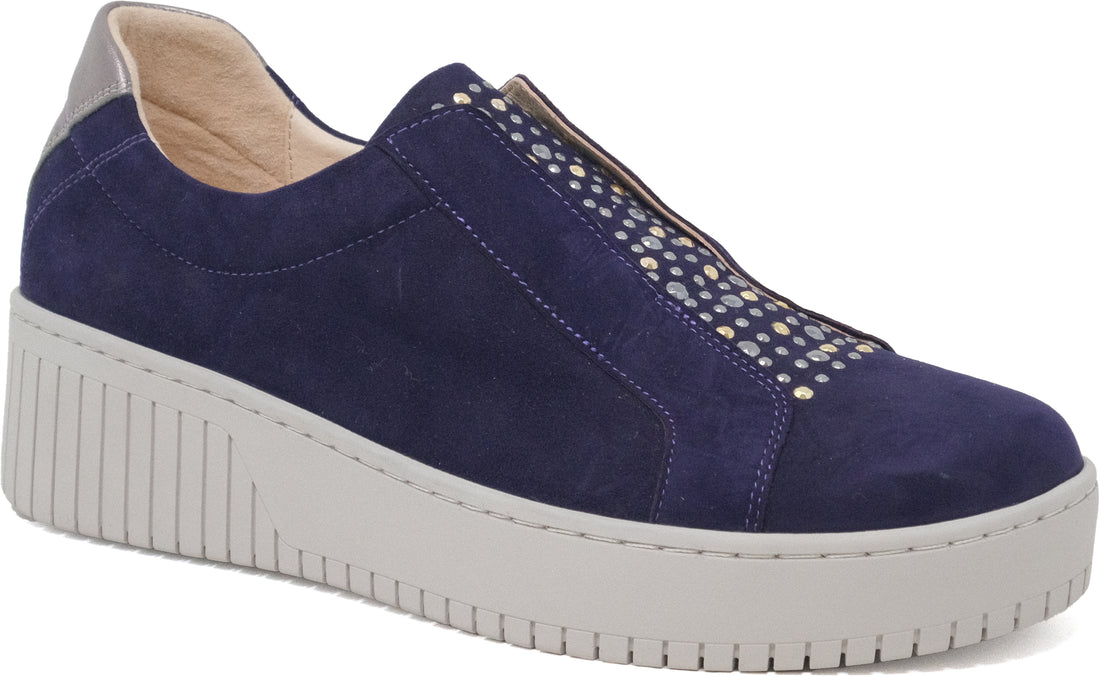 Blue sneaker with a white sole on a white background