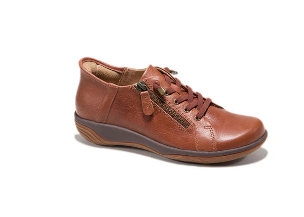 Brown leather shoe on a white background