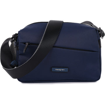 Quarter turn view Women's Hedgren Hand Bag style name Neutron Crossbody in color Navy Cosmos. Sku: HNOV02-795