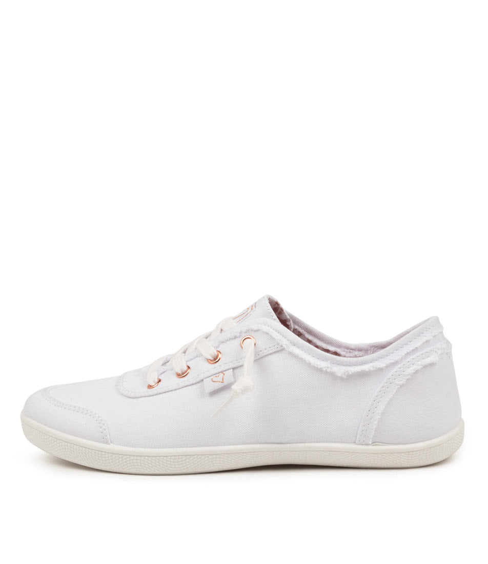 A white canvas low-top sneaker with white laces, rose gold eyelets, and a frayed detail on the side, shown against a plain white background.