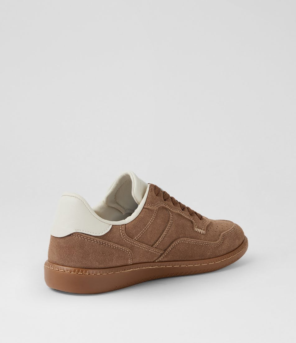 A low-top brown suede sneaker with a cream-colored heel tab and collar lining, shown from a three-quarters angle on a light gray background.