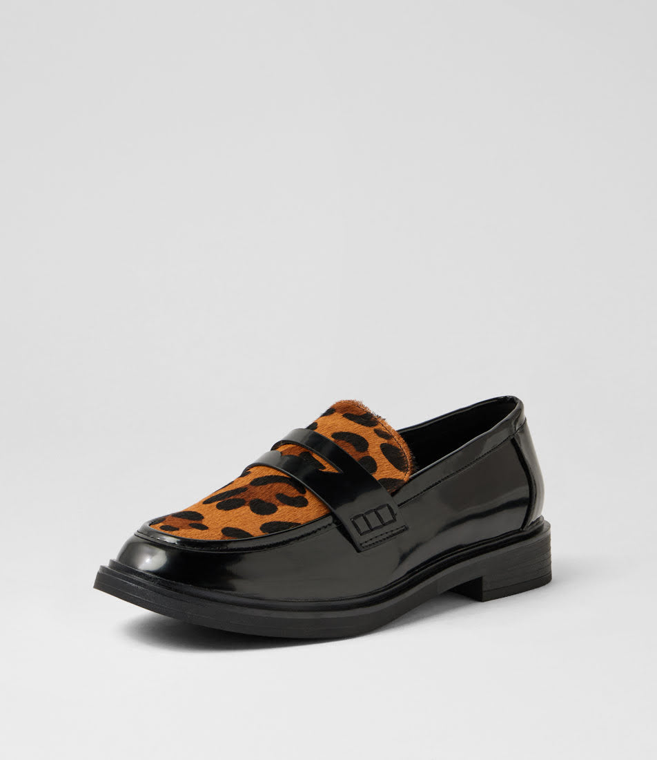 A single loafer shoe with a glossy black patent leather upper and a contrasting orange and black leopard print suede vamp, shown on a light gray background.