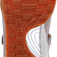 Close-up of the outsole of a sneaker, showing a textured orange rubber tread with a white circular logo area and the word 'ofofox' visible near the bottom.