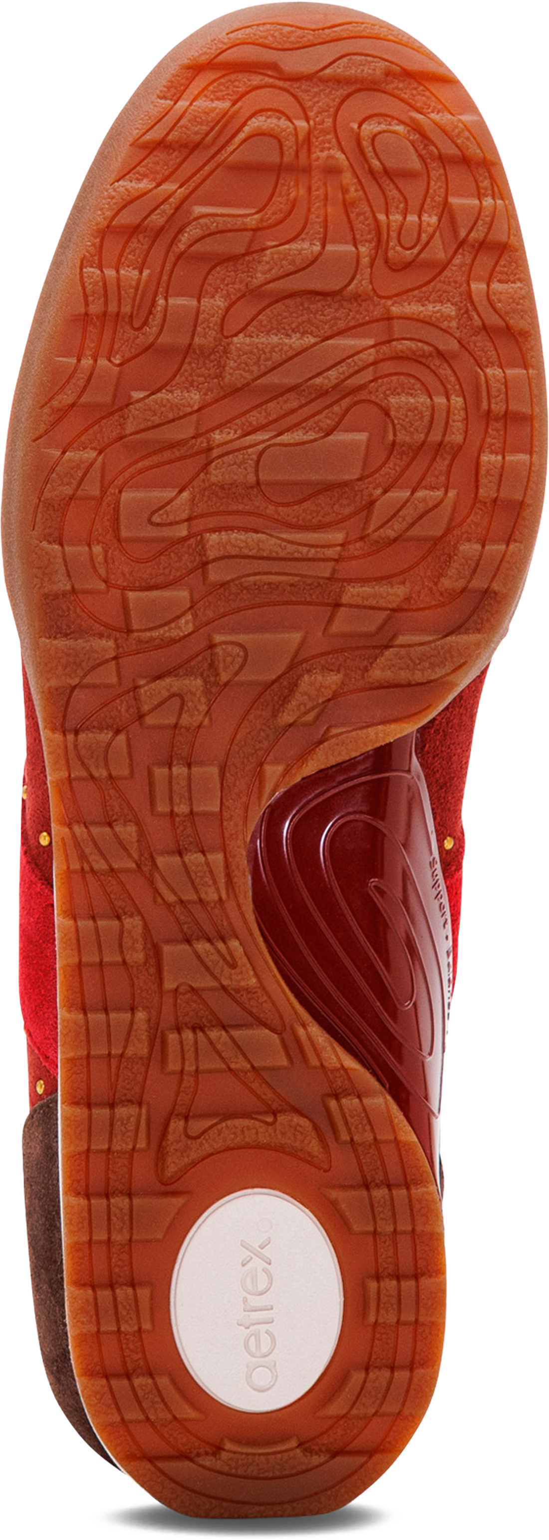 Close-up of the textured orange-brown outsole of a red athletic shoe, showing the Gel-FX cushioning system and a white circular Gel logo.