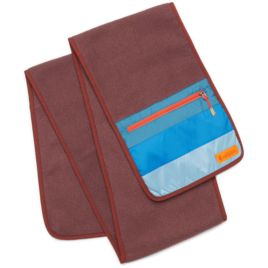 Quarter turn view Women's Cotopaxi Accessories style name Teca Fleece Scarf in color Rust Bucket. Sku: TFSC-F24-RTBUC