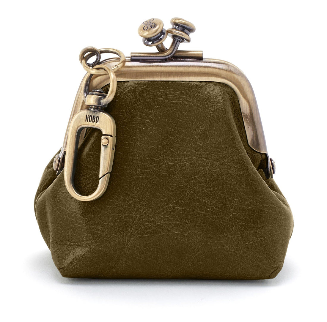 Green leather purse with gold clasp and keychain on a white background