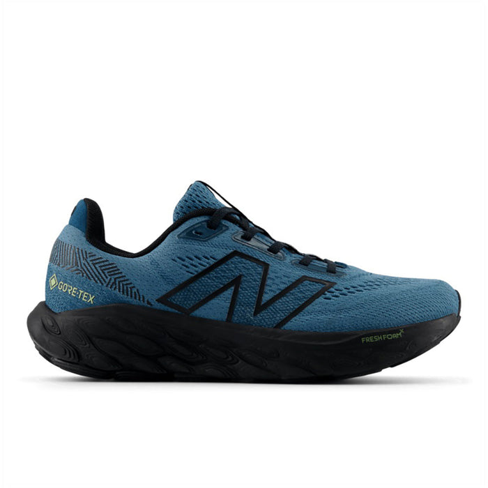 Quarter turn view Women's New Balance Footwear style name 880V14 GTX Medium in color Terrarium/ Black/ Deep Sea. Sku: W880GB14-B