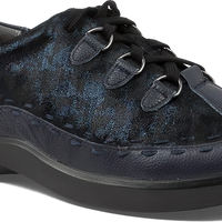 Navy blue shoe with black accents on a white background
