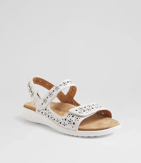 White sandal with wooden sole on a light gray background
