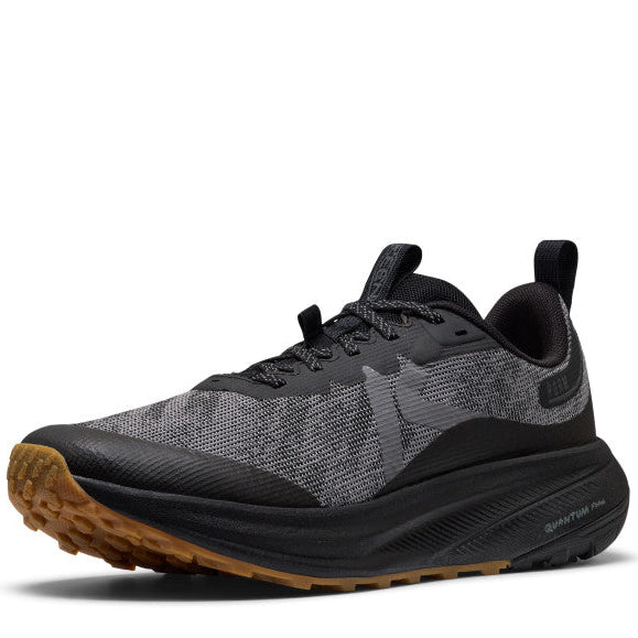 Black and brown athletic shoe on a white background