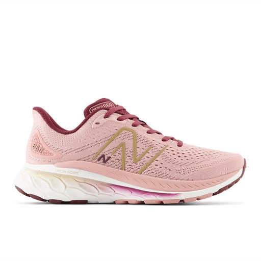 Quarter view Women's New Balance Footwear style name Fresh Foam X 860V13 Medium in color Pink Moon/ Nb Burgundy. Sku: W860R13-1B